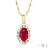 5x3 MM Oval Shape Ruby and 1/20 Ctw Round Cut Diamond Halo Precious Pendant with Chain in 14K Yellow Gold