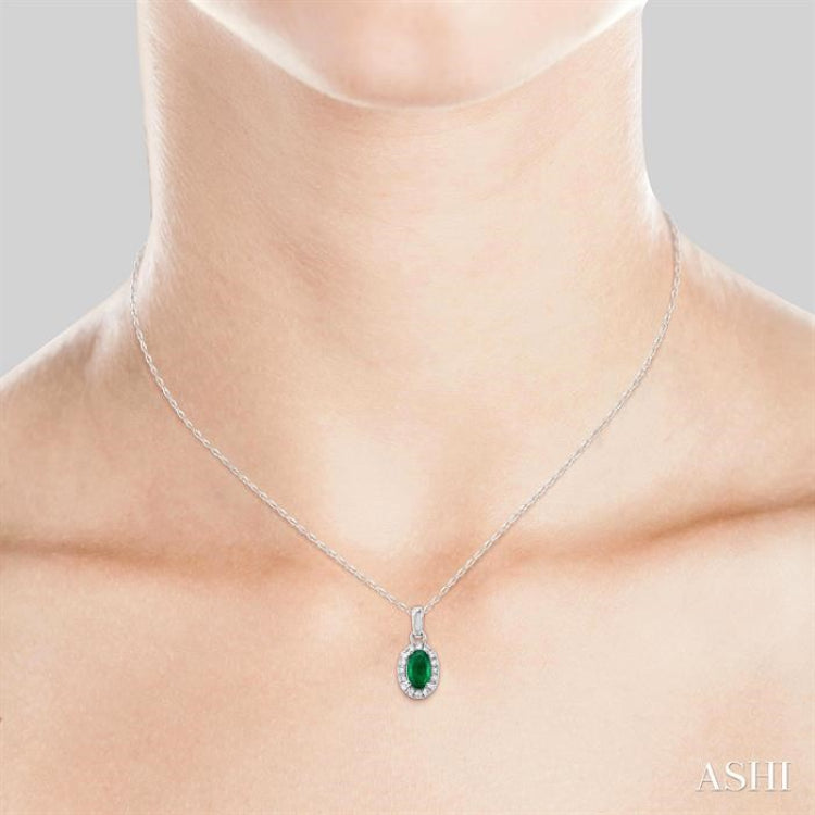 5x3 MM Oval Shape Emerald and 1/20 Ctw Round Cut Diamond Halo Precious Pendant with Chain in 10K White Gold