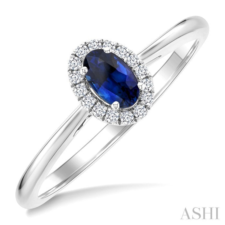 5x3 MM Oval Shape Sapphire and 1/20 Ctw Round Cut Diamond Halo Precious Ring in 14K White Gold