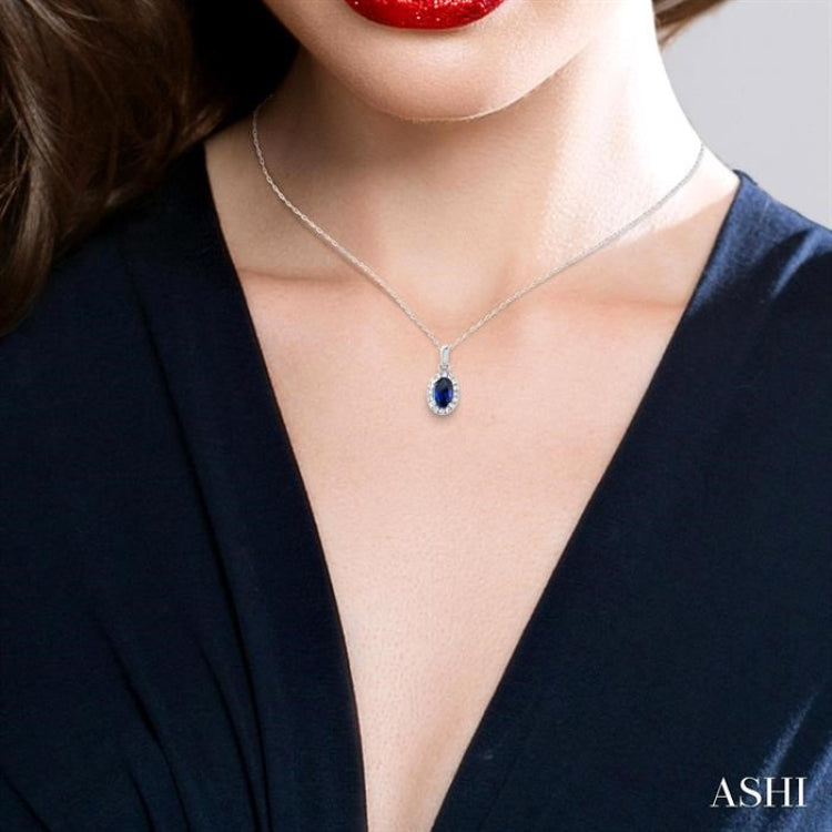 5x3 MM Oval Shape Sapphire and 1/20 Ctw Round Cut Diamond Halo Precious Pendant with Chain in 10K White Gold