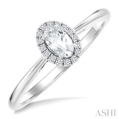 5x3 MM Oval Shape White Topaz and 1/20 Ctw Round Cut Diamond Halo Semi-Precious Ring in 14K White Gold