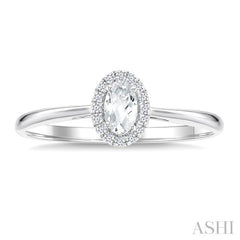 5x3 MM Oval Shape White Topaz and 1/20 Ctw Round Cut Diamond Halo Semi-Precious Ring in 14K White Gold
