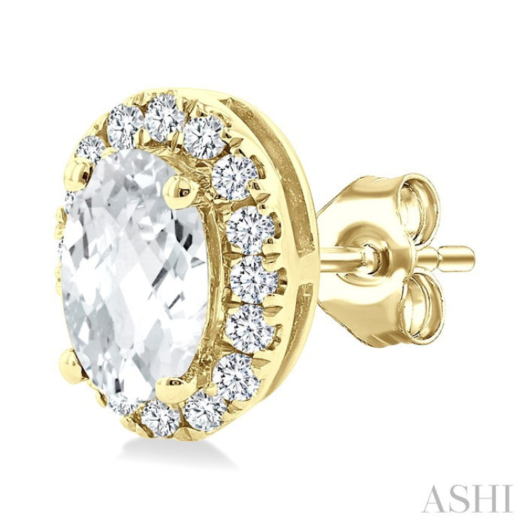 5x3 MM Oval Shape White Topaz and 1/8 Ctw Round Cut Diamond Halo Semi-Precious Stud Earrings in 10K Yellow Gold
