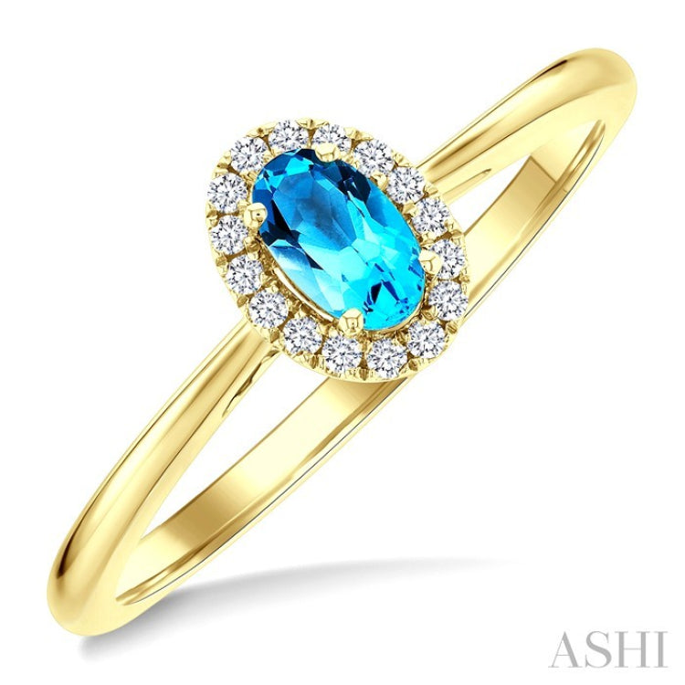 5x3 MM Oval Shape Blue Topaz and 1/20 Ctw Round Cut Diamond Halo Semi-Precious Ring in 14K Yellow Gold