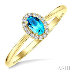 5x3 MM Oval Shape Blue Topaz and 1/20 Ctw Round Cut Diamond Halo Semi-Precious Ring in 14K Yellow Gold