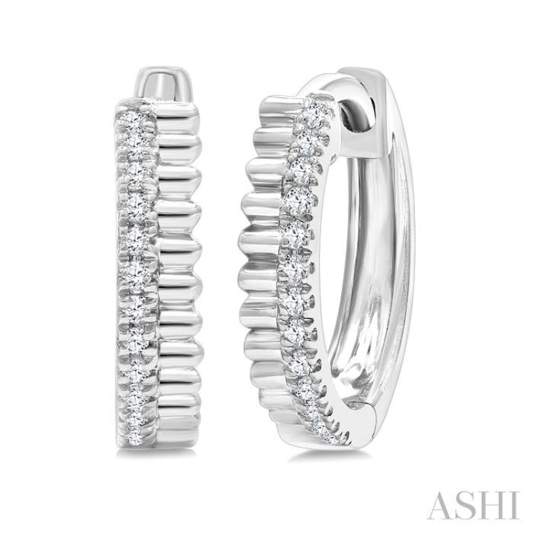 1/10 Ctw Fluted Round Cut Diamond Petite Huggie Earrings in 10K White Gold