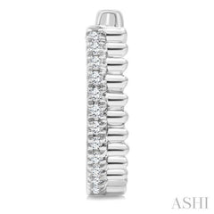 1/10 Ctw Fluted Round Cut Diamond Petite Huggie Earrings in 10K White Gold