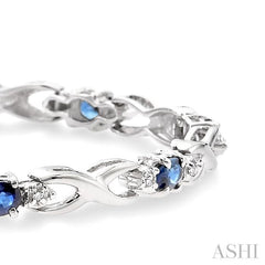 4x3 MM Oval Cut Sapphire and 1/10 Ctw Round Cut Diamond Bracelet in 14K White Gold
