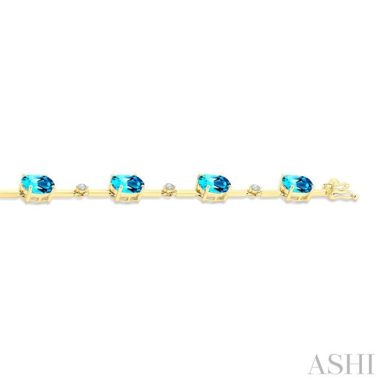 8x6 MM Oval Shape Blue Topaz and 1/4 Ctw Round Cut Diamond Semi-Precious Bracelet in 10K Yellow Gold