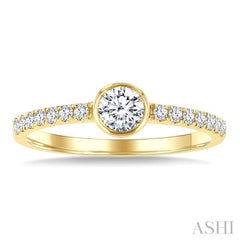 1/2 Ctw Bezel Set Round Cut Diamond Ring in 14K Yellow Gold