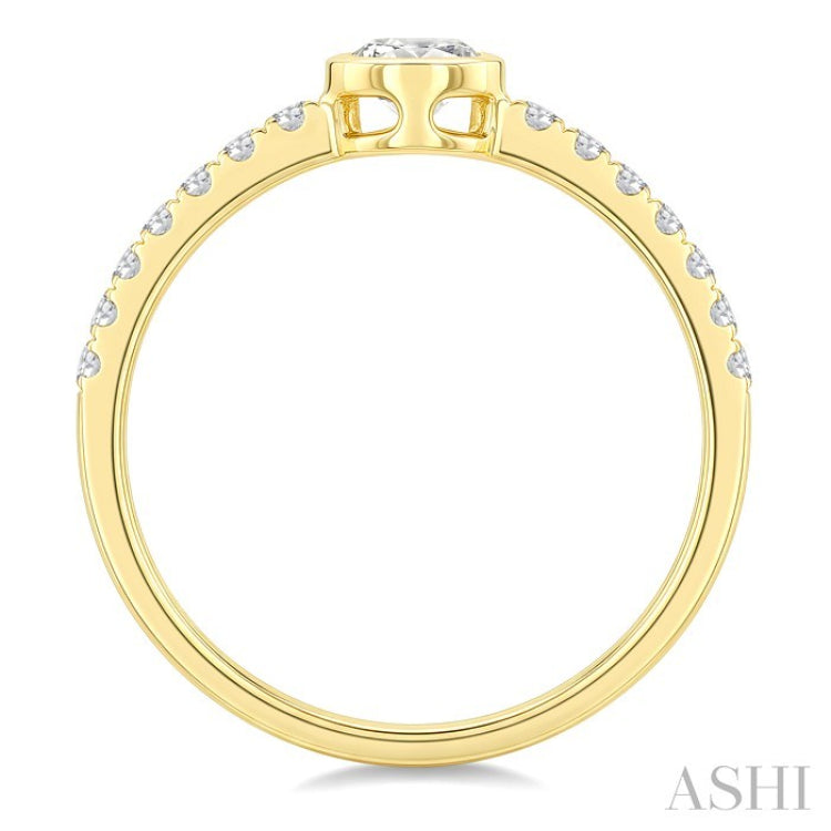 1/2 Ctw Bezel Set Round Cut Diamond Ring in 14K Yellow Gold