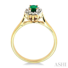 5x3mm Oval Cut Emerald and 1/10 Ctw Round Cut Diamond Ring in 10K Yellow Gold