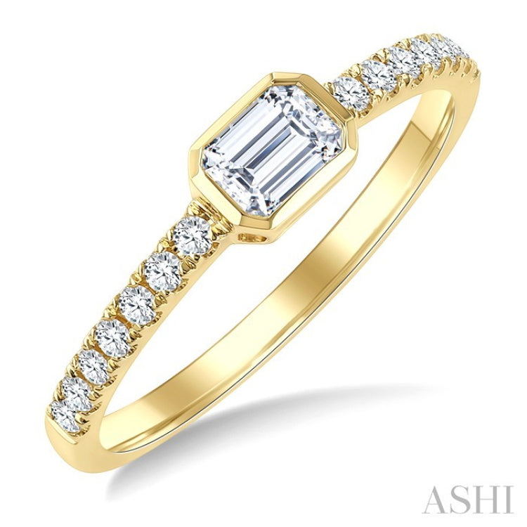 1/2 Ctw East-West Emerald Cut and Round Cut Diamond Ring in 14K Yellow Gold