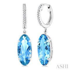 14X6 MM Oval Shape Blue Topaz and 1/10 Ctw Round Cut Diamond Semi-Precious Earrings in 14K White Gold
