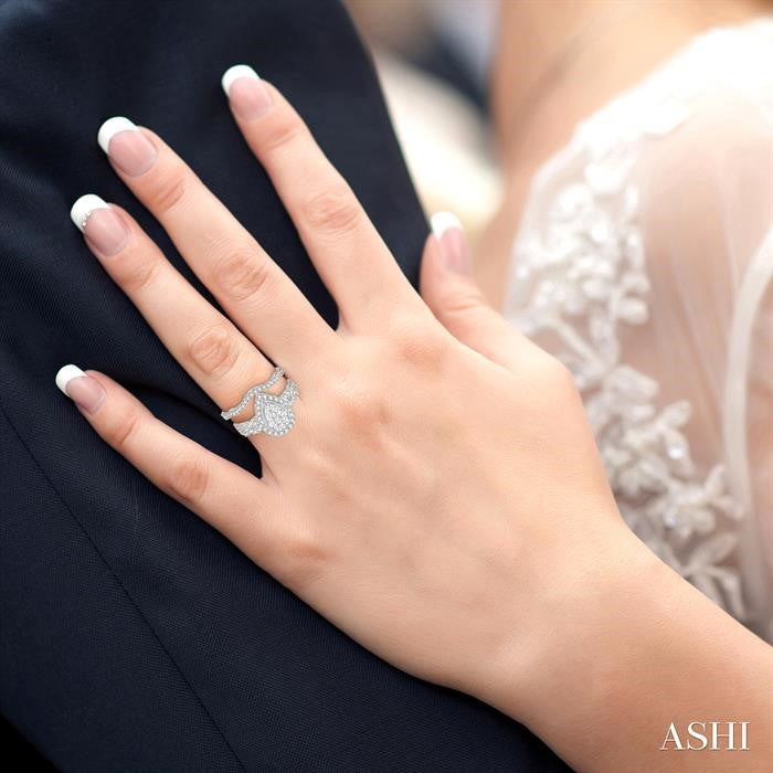1 1/5 Ctw Lovebright Round Diamond Wedding Set With 1 Ctw Pear Shape Twisted Shank Engagement Ring and 1/5 Ctw Wedding Band in 14K White Gold
