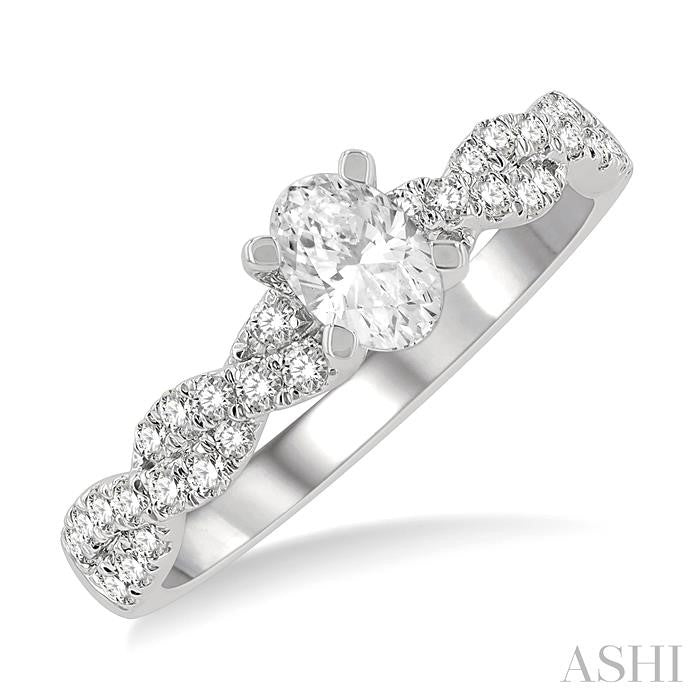 7/8 Ctw Twisted Shank Round Cut Diamond Engagement Ring With 1/2 Ct Oval Cut Center Stone in 14K White Gold