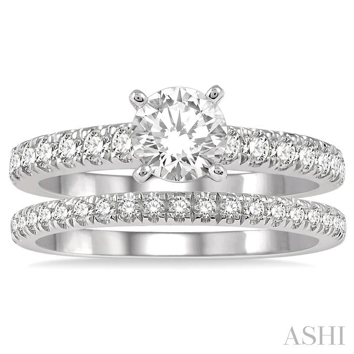 7/8 Ctw Round Cut Diamond Wedding Set With 5/8 Ct Engagement Ring and 1/4 Ct Wedding Band in 14K White Gold