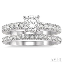 7/8 Ctw Round Cut Diamond Wedding Set With 5/8 Ct Engagement Ring and 1/4 Ct Wedding Band in 14K White Gold