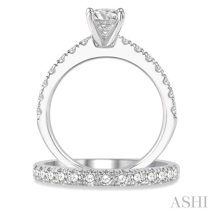 7/8 Ctw Round Cut Diamond Wedding Set With 5/8 Ct Engagement Ring and 1/4 Ct Wedding Band in 14K White Gold