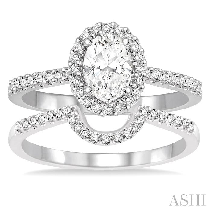 7/8 Ctw Diamond Wedding Set With 3/4 Ctw Oval Shape Engagement Ring and 1/6 Ctw Wedding Band in 14K White Gold