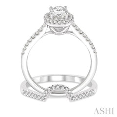 7/8 Ctw Diamond Wedding Set With 3/4 Ctw Oval Shape Engagement Ring and 1/6 Ctw Wedding Band in 14K White Gold