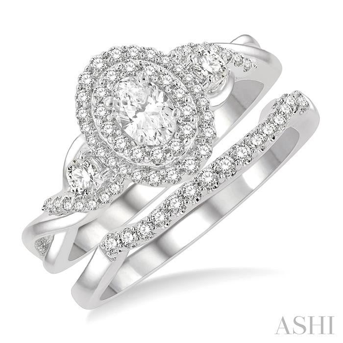3/4 Ctw Round Cut Diamond Wedding Set With 5/8 Ct Split Shank Oval Cut Center Stone Engagement Ring and 1/8 Ct Wedding Band in 14K White Gold