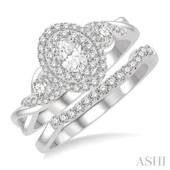 3/4 Ctw Round Cut Diamond Wedding Set With 5/8 Ct Split Shank Oval Cut Center Stone Engagement Ring and 1/8 Ct Wedding Band in 14K White Gold