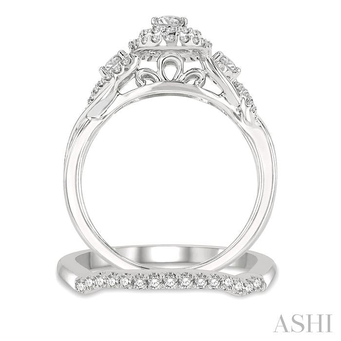 3/4 Ctw Round Cut Diamond Wedding Set With 5/8 Ct Split Shank Oval Cut Center Stone Engagement Ring and 1/8 Ct Wedding Band in 14K White Gold