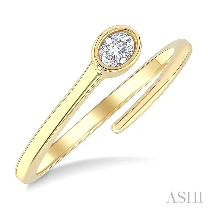 1/6 Ctw Bypass Bezel Set Oval Cut Diamond Open Fashion Ring in 14K Yellow Gold