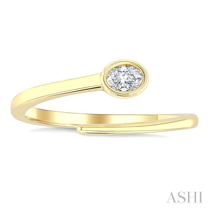 1/6 Ctw Bypass Bezel Set Oval Cut Diamond Open Fashion Ring in 14K Yellow Gold
