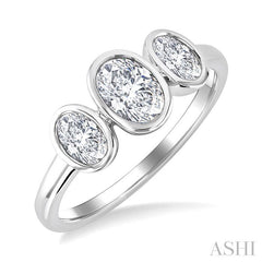 1 Ctw 3-Stone Bezel Set Oval Cut Diamond Ring in 14K White Gold