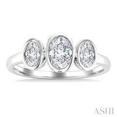 1 Ctw 3-Stone Bezel Set Oval Cut Diamond Ring in 14K White Gold