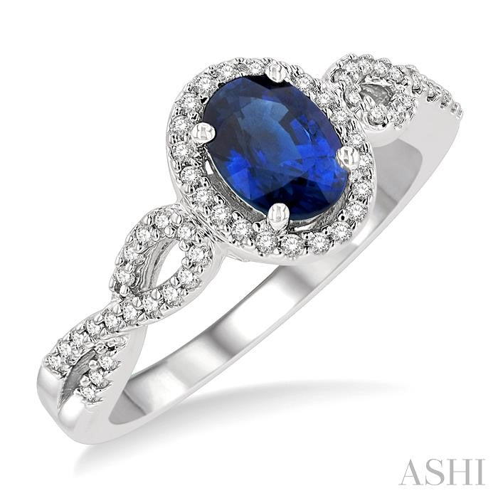 7x5 MM Oval Cut Sapphire and 1/5 Ctw Twisted Split Shank Round Cut Diamond Precious Ring in 14K White Gold