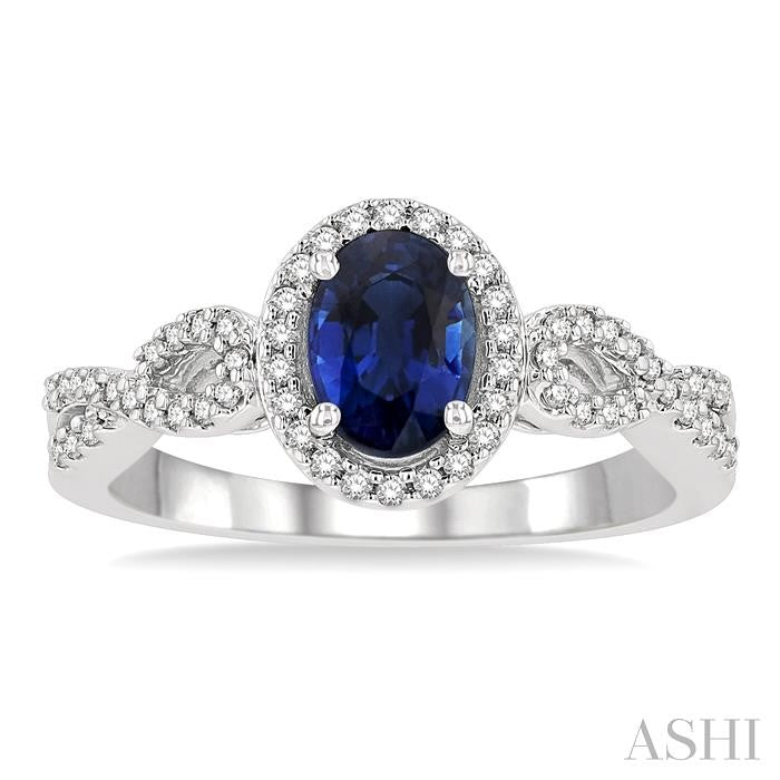 7x5 MM Oval Cut Sapphire and 1/5 Ctw Twisted Split Shank Round Cut Diamond Precious Ring in 14K White Gold