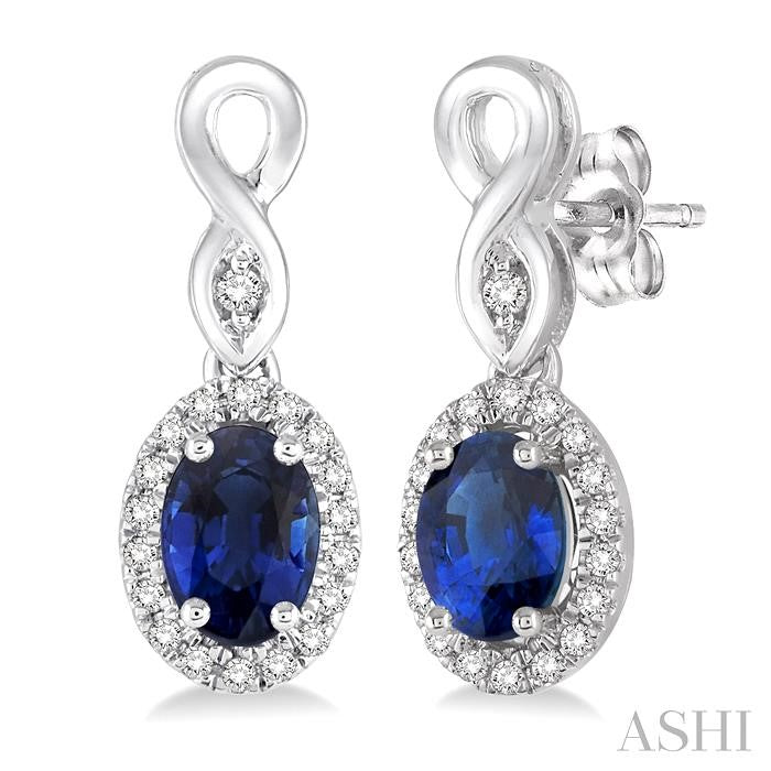 5x3 MM Oval Cut Sapphire and 1/6 Ctw Round Cut Diamond Earrings in 14K White Gold