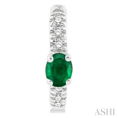4X3 MM Oval Cut Emerald and 1/10 Ctw Petite Round Cut Diamond Fashion Huggies in 10K White Gold