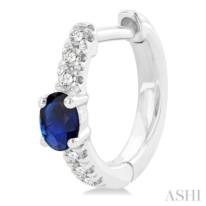 4X3 MM Oval Cut Sapphire and 1/10 Ctw Petite Round Cut Diamond Fashion Huggies in 10K White Gold
