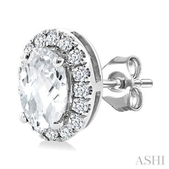 5x3 MM Oval Shape White Topaz and 1/8 Ctw Round Cut Diamond Halo Semi-Precious Stud Earrings in 10K White Gold