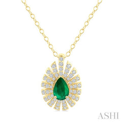 1/3 Ctw Starburst 6X4MM Pear Cut Emerald and Round Cut Diamond Precious Pendant With Chain in 14K Yellow Gold