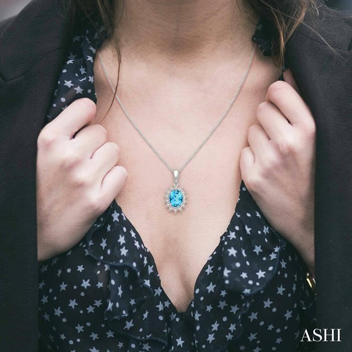 8X6 MM Oval Shape Blue Topaz and 1/10 Ctw Round Cut Diamond Semi-Precious Pendant With Chain in 10K White Gold