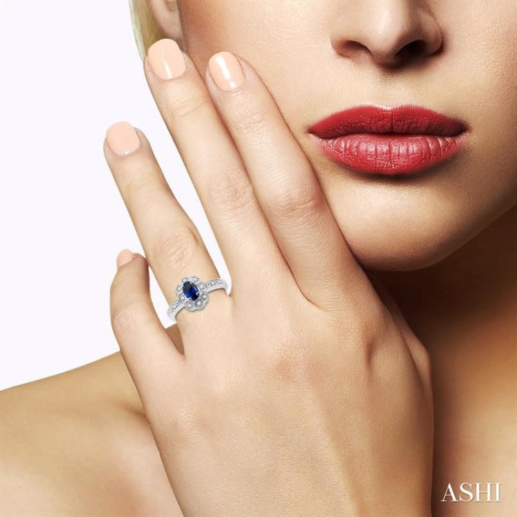 6x4 MM Oval Cut Sapphire and 1/20 Ctw Round Cut Diamond Ring in Sterling Silver