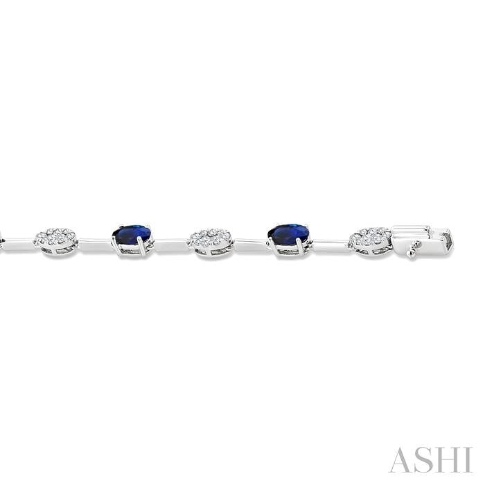 5x3 MM Oval Shape Sapphire and 5/8 Ctw Lovebright Round Cut Diamond Precious Fashion Bracelet in 10K White Gold