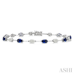 5x3 MM Oval Shape Sapphire and 5/8 Ctw Lovebright Round Cut Diamond Precious Fashion Bracelet in 10K White Gold