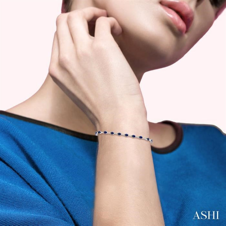 4x3 MM Oval Cut Sapphire and 1/3 Ctw Round Cut Diamond Precious Bracelet in 10K White Gold