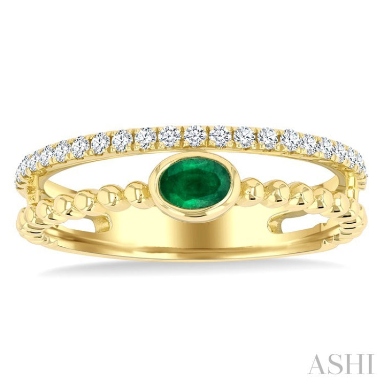 4x3 MM Oval Shape Emerald and 1/5 Ctw Round Cut Diamonds Precious Fashion Split Twin Ring in 10K Yellow Gold