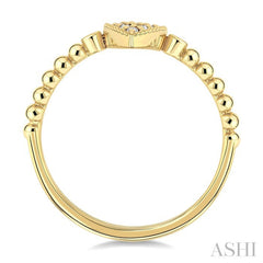 1/8 Ctw Petite Bead Shank Pear Shape Center Round Cut Diamond Fashion Ring in 10K Yellow Gold