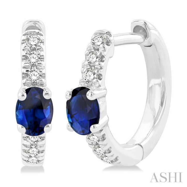 4X3 MM Oval Cut Sapphire and 1/10 Ctw Petite Round Cut Diamond Fashion Huggies in 10K White Gold