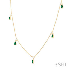 5x3 MM Pear Shape Emerald and 1/8 Ctw Round Cut Diamonds Precious Station Necklace in 10K Yellow Gold
