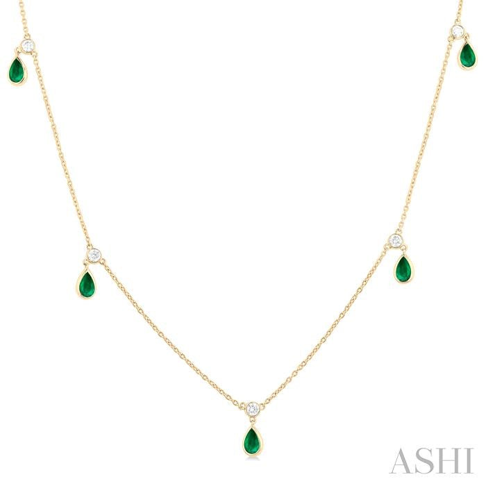 5x3 MM Pear Shape Emerald and 1/8 Ctw Round Cut Diamonds Precious Station Necklace in 10K Yellow Gold