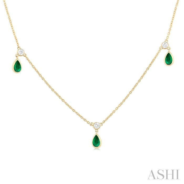 5x3 MM Pear Shape Emerald and 1/8 Ctw Round Cut Diamonds Precious Station Necklace in 10K Yellow Gold